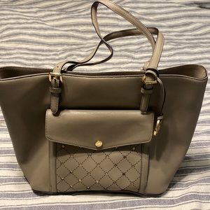 Lightly used Michael Kors taupe purse, gold accents.